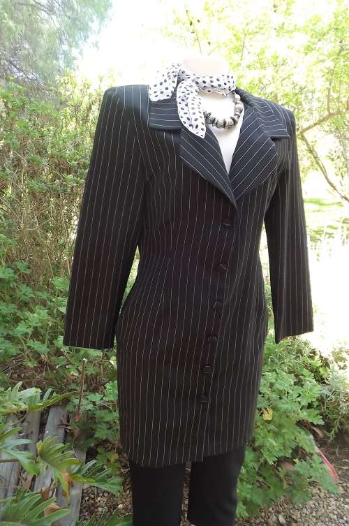 Black pencil stripe long smart jacket by Sairit Honore .Size 34/10.Tailored style.Button down front.