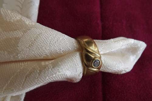 Stunning ring with zirconia stone.Marked as 9 ct gold but does not test as gold.Size 8.Good conditio