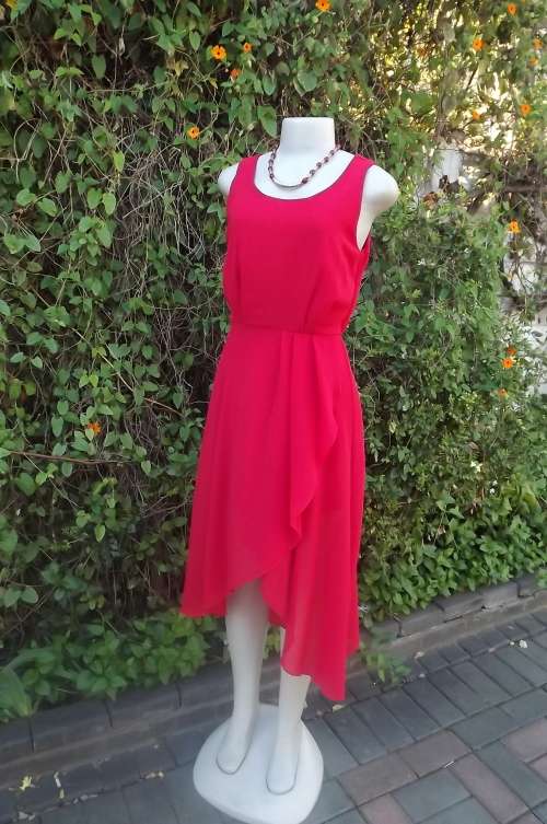 Pretty pull over boutique made dress from Thailand.Size 36/12.Sleeveless with rounded neckline