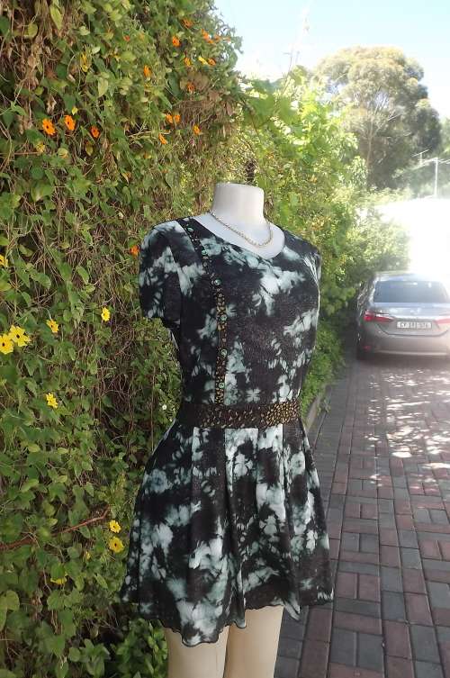 Smart mintgreen/black glimmer dress for that special date.Size 36/12 by FEICUIYIREN.