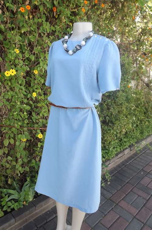 Cavia sky blue sheer textured dress with tucking on left top.Size 38/14.Rounded neckline