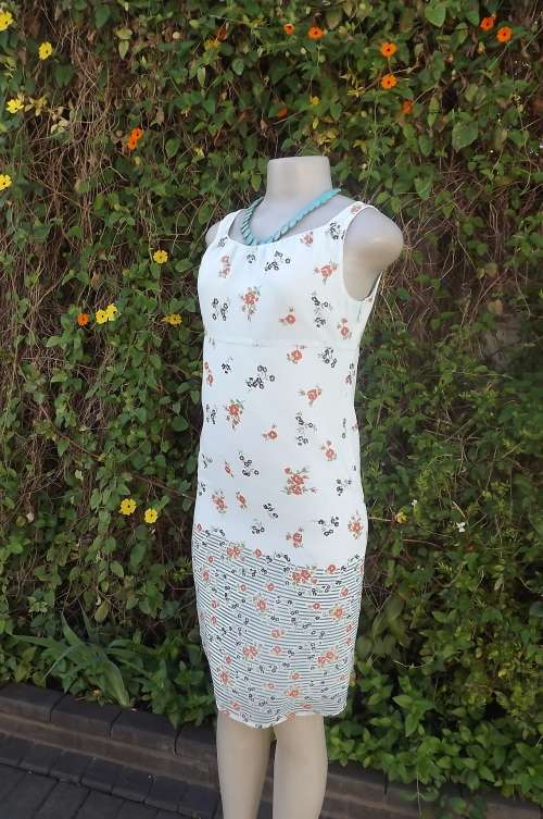 Cheery cool summer dress with empire waist.Size 32/8 by PEYTON PLACE sheer floral polyester
