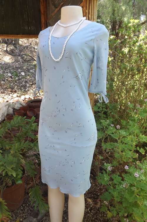 Fabulous badycon lined skyblue size 32/8 dress in atextured sheer polyester by LOUISE