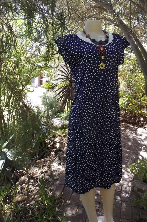 Navy and white polkadot shift dress. Label  unreadable.Size 36/12.In good condition.