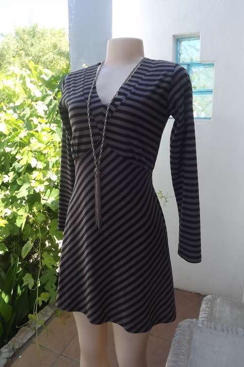 Pretty long sleeve mini dress in silvergrey and black stripes.Size 32/8 by AUDECITY empire waist