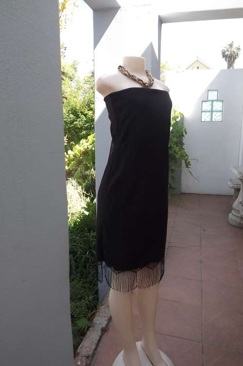 Sexy black strapless cocktail dress.Inner layer stretch polyester.In size 36/12 by NECESSARY