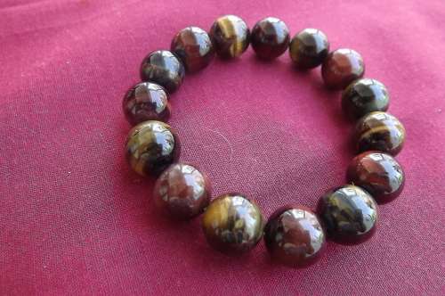Fabulous  tiger eye bracelet with some stretch.Different colours.New condition