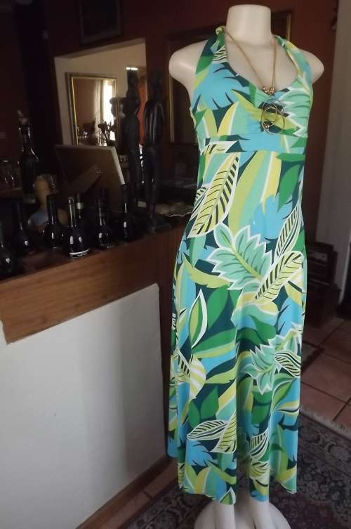 Fabulous halter neck long dress by EXACT in size 32/8.In stretch polyester.New condition