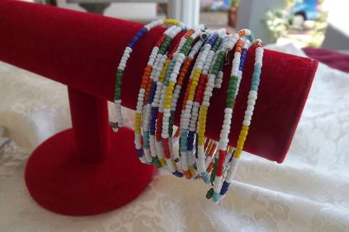 2 x Sets of 6 ethnic colourful bead bangles.R 65.00 per set.