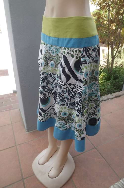 Colourful a line polycotton skirt yoked without waistband.Size 42/18. Panelled with some embroidery