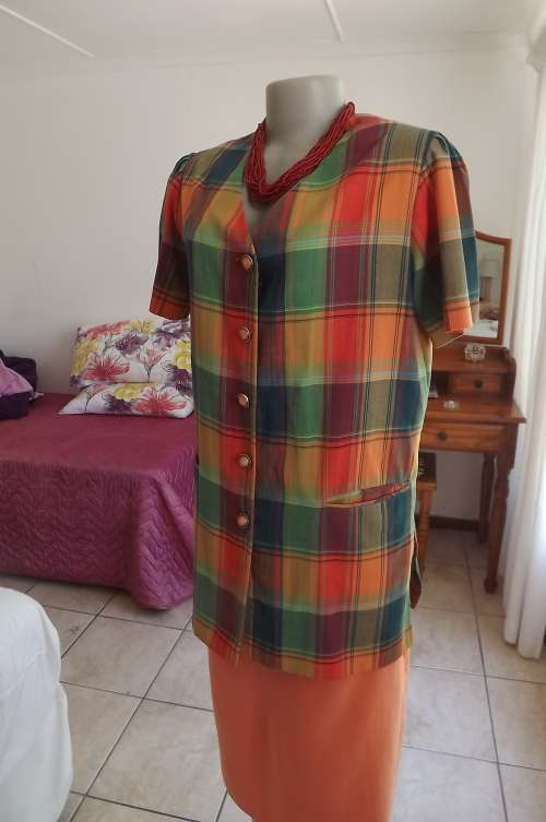 Power check printed summer jacket in cheerful colours.Size 38/14.In cotton.As new