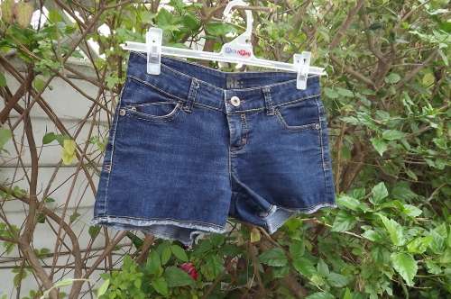 Cute blue denim shorts in size 32/8 by RE with back and front pockets.As new