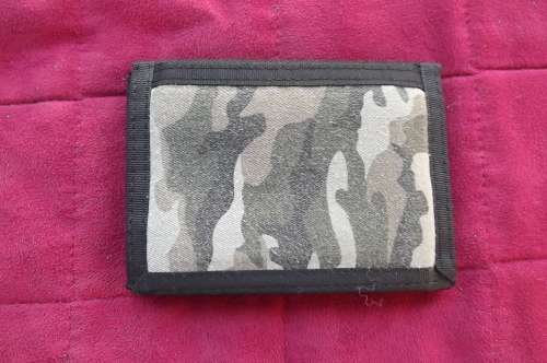 Men`s black wallet with camo front.Size 12 x 9cm.New condition
