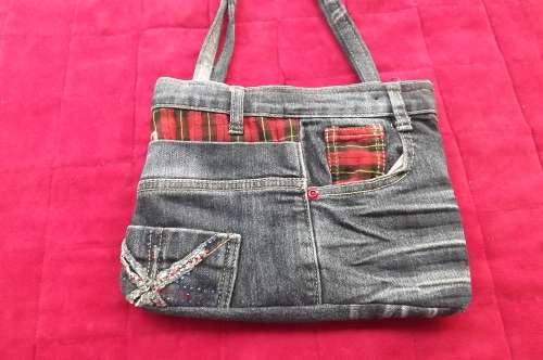 Chic blue denim handbag from previously used denim jeans.With red tartan check decoration