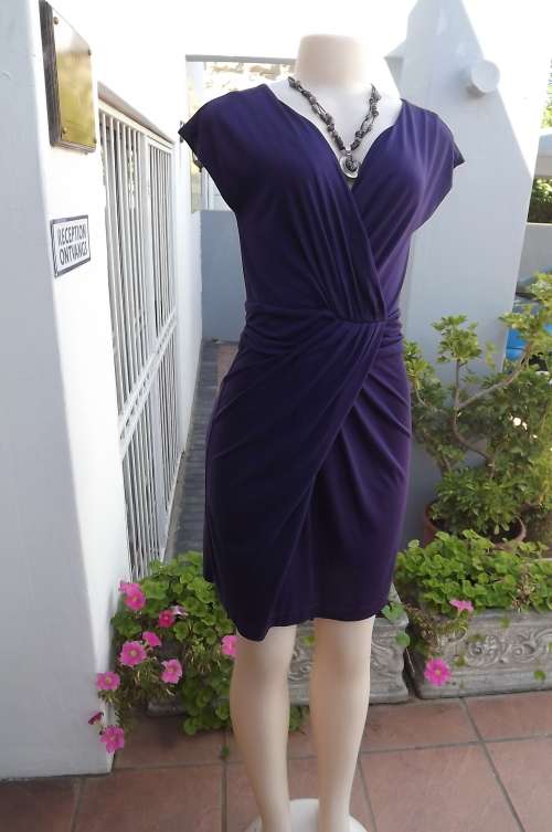 Sexy dark purple draped front dress by LE SOUK in size 32/8.Tiny cut-on sleeves.