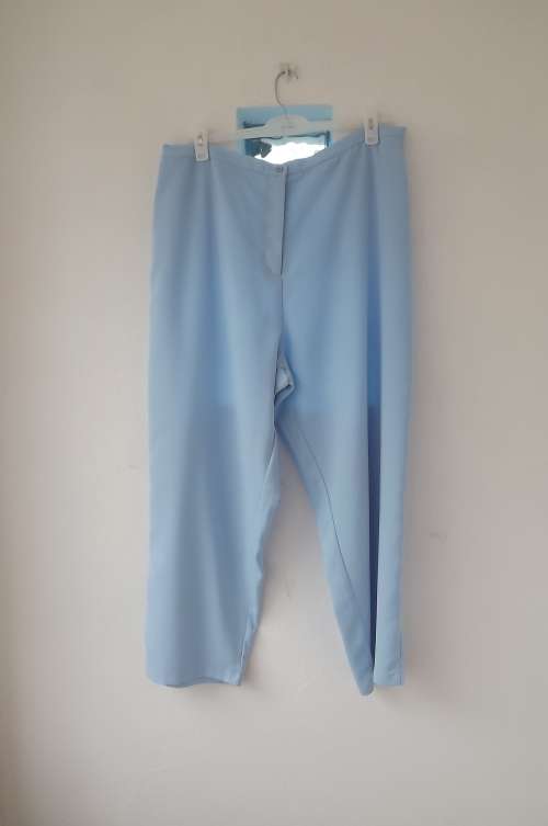 Fabulous classic light blue 100% wash + wear polyester pants by ANNA PIA in size 48/24