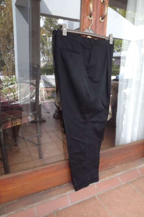 Men's black chino pure cotton pants size 34.By WOOLWORTHS.Inside leg 79cm.Good condition