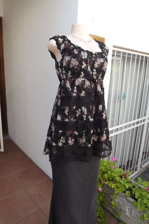 Beautiful frilly top in black sheer polyester/nylon.Size 36/12.By PAIX ET DOUX.