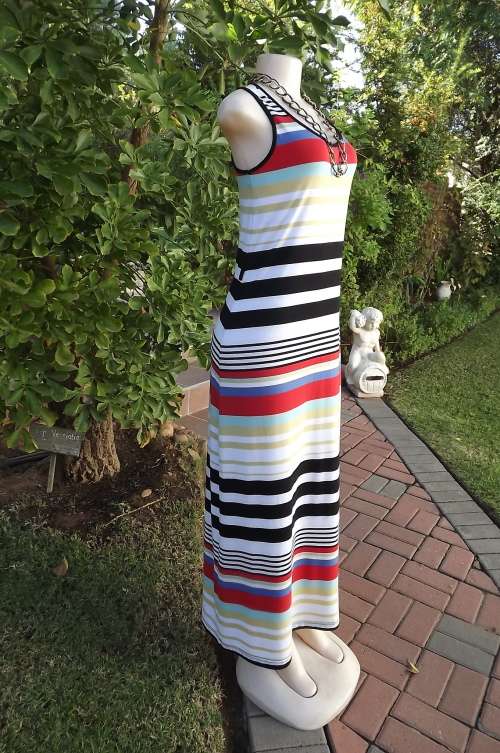 Maxi sleeveless dress in red,blue,black and white and cream horizontal stripes.By TRUWORTHS