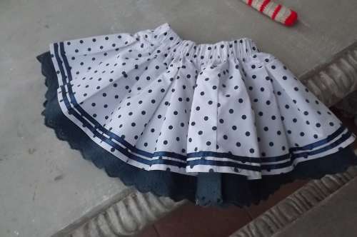 Cute little white and blue polkadot flare mini skirt for 3 to 4  year old.In polycotton fabric.