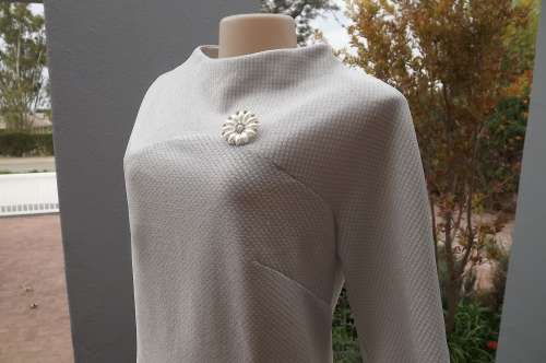 White & silver lame timeless evening dress.Size 34/10.Elbow length saddle sleeves.High cut neckline.