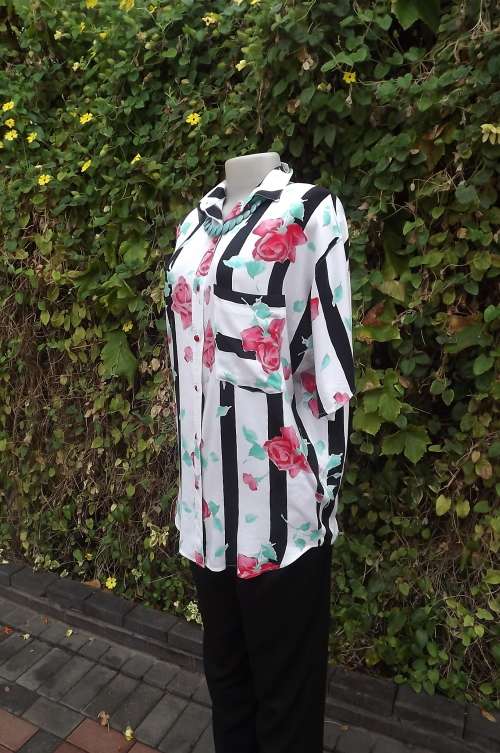 Attention grabing SHELLEY SPORT white blouse with vertical black stripes & red roses.Size 36/12