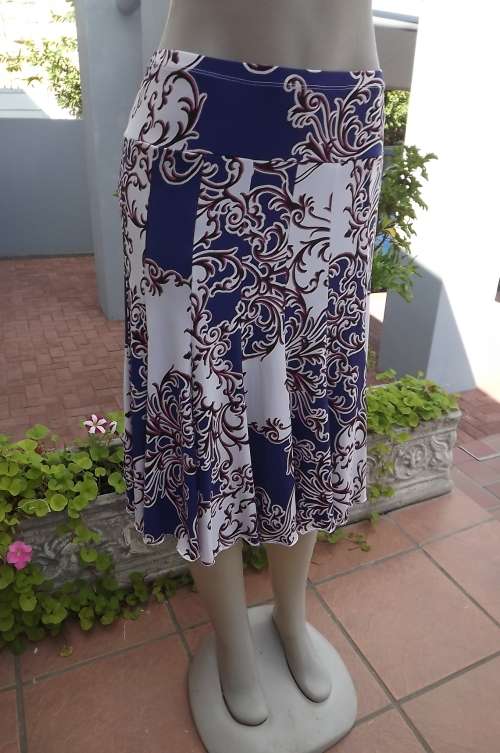 Baroque print flare skirt made up in 16 small panels. Size 34.Lined.New item from Thailand!