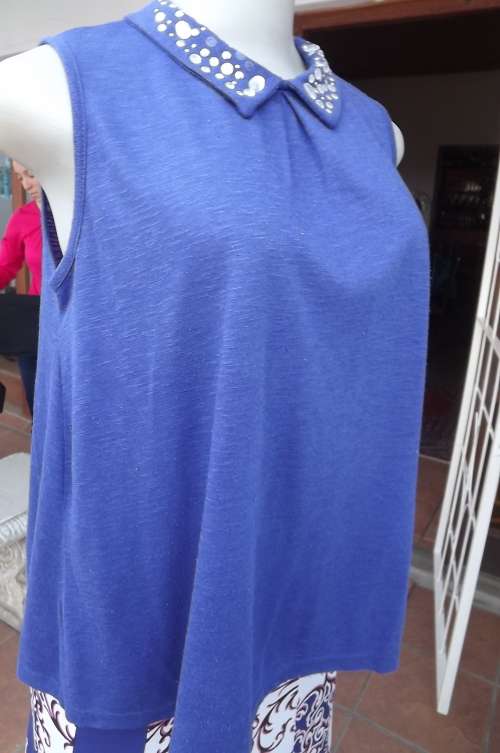 Royal blue loose hanging top with high embellished collar.Size 34/10 by LEGIT.Opening at back.