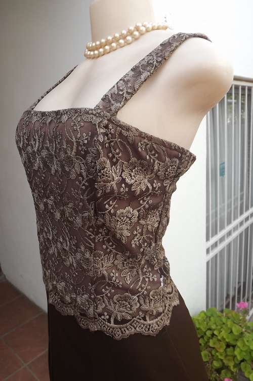 Sexy but smart light brown 100% polyester strappy evening top.In size 34/10.In light brown