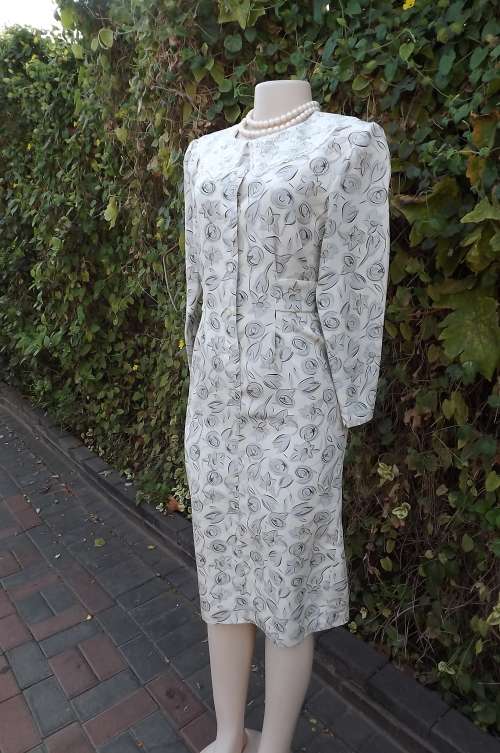 Finely detailed vintage dress in subtle colours by PAGE ONE.Size 34/10.As new