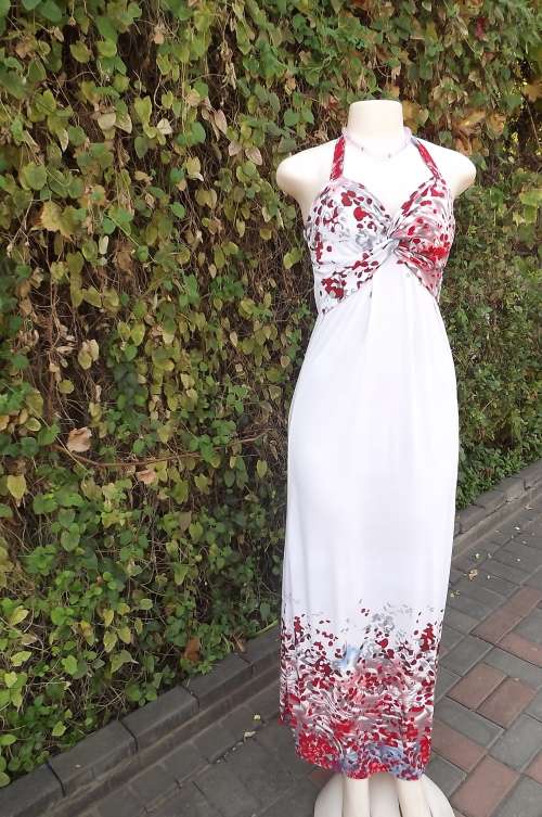 Sexy white maxi halter neck dress with pink/red patterned bust and border.Size 34/10.
