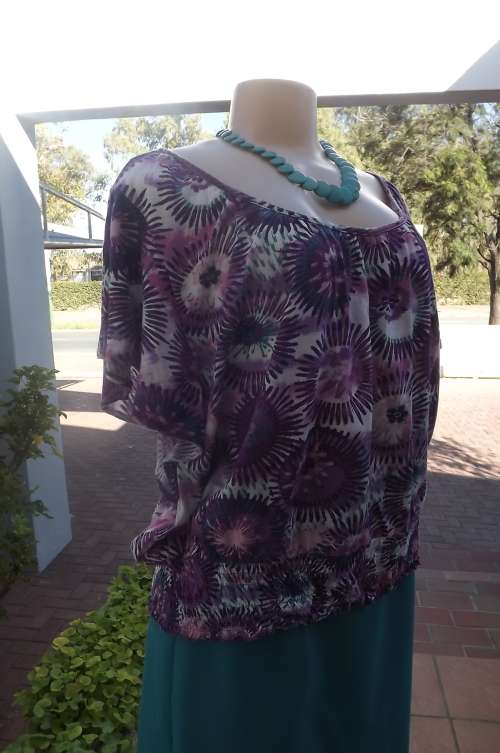 Purple,white and turquoise 100% stretch cotton top by FASHION BUG size 40/16.Short flare sleeve