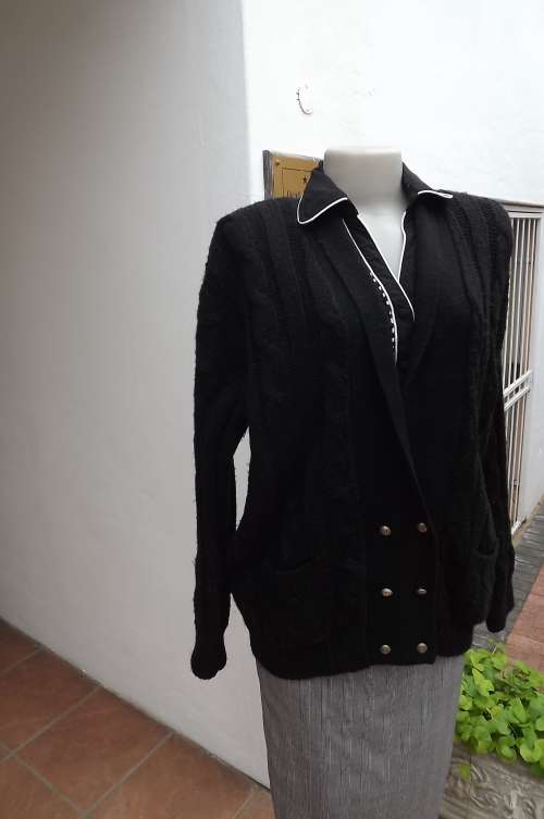 Bulky black double breast knitted cardigan by RIO in size 40 Large.Pockets on front.