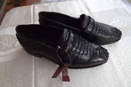 Amazing pair of black classic men's genuine crocodile leather shoes.Size 11.5.Original FUNDIG