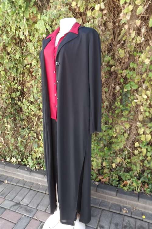 Simple black ankle length stretch polyester loose coat.High slits at sides.Size 38/14 by ART WOOD