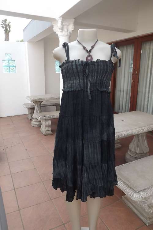 Sassy strappy dress in shades of grey with tiered skirt and elasticated bust.Size 32/8