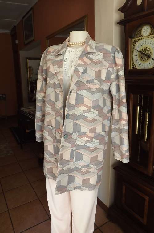 Boutique made long 100% cotton jacket in geometric pattern in peach,beige,grey and blue