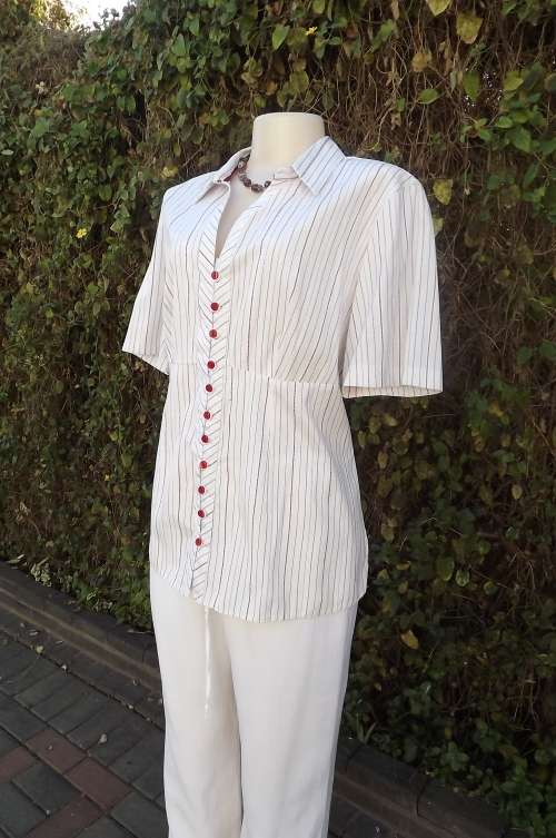 White stretch polycotton top with red embossed vertical stripes.Empire style.Size 40/16.