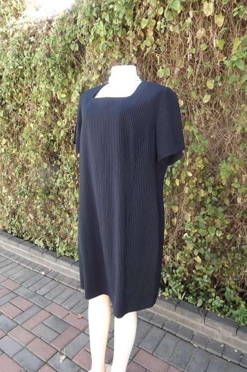 Black and white pencil stripe dress with short sleeves.Princess style.Size 45/23