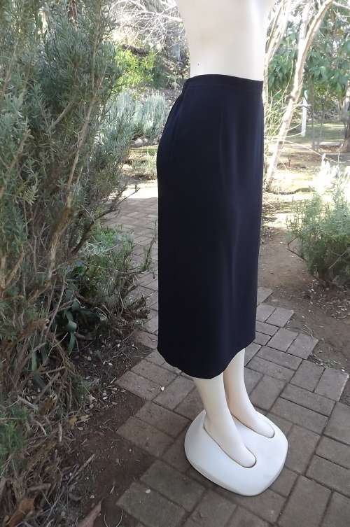 Classic navy pencil skirt by DONNA-CLAIRE.Size 40/16.Ankle length.Slit at back.Good condition
