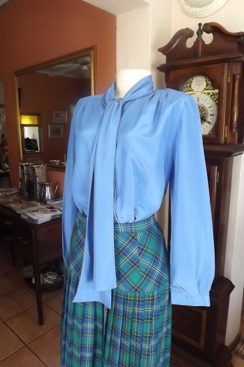 Smart french blue long sleeve silky polyester blouse with tie collar.Size 40/16.As new