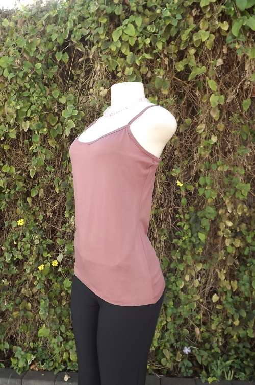 Dusty pink strappy top in stretch polyester.Size 36/12.used but in good condition.