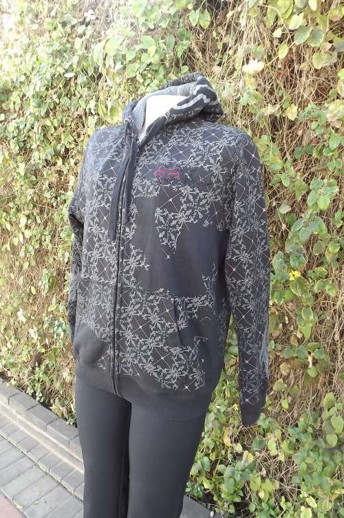 Snug black hooded jacket by FOX size 38/14.Zip up front.New condition