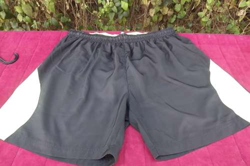 Black 100% polyester men's shorts by MAXED in size XL.Pants inner with yellow inlays.
