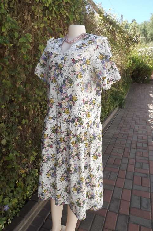 Cool cotton cropped waist floral dress.Button down top.Size 38/14.Short sleeves.