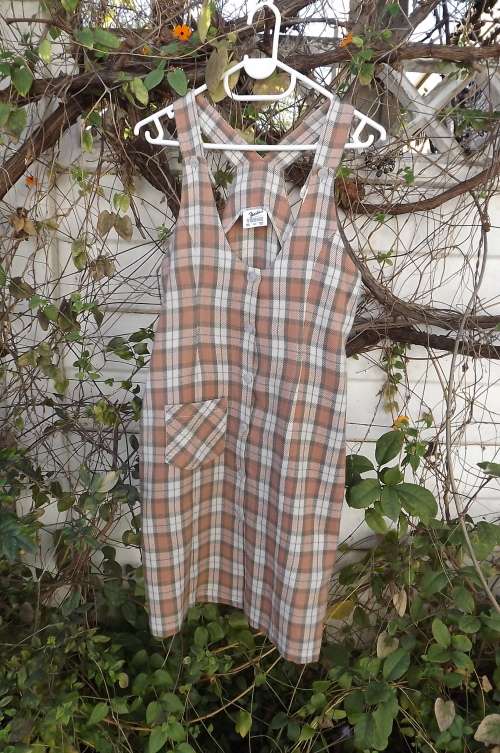 Winters pinafore in coal,beige and navy check for 13 to 14 year old girl by FOSHINI.Bust 76cm.