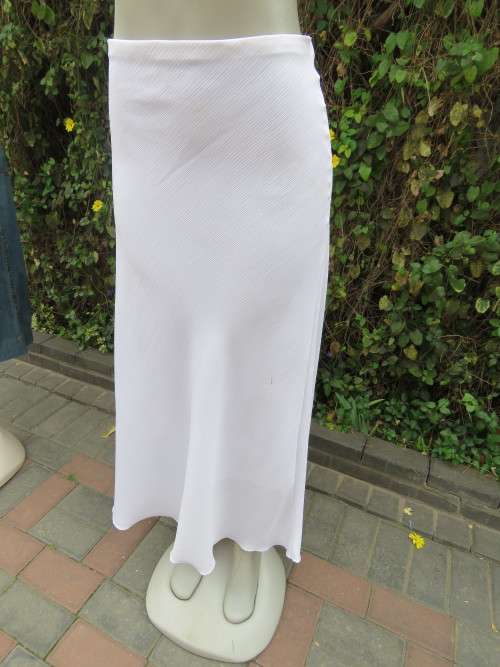 White crinkled sheer polyester maxi skirt with lining.Elasticated middle.Size 40/16.As new