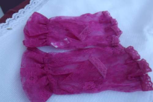 pair of pink lace fingerless gloves in size Small for special event.Wrist length