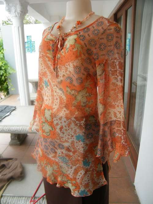Colourful sleek sheer polyester long pull over top in orange/blue/white shades.Size 36/12