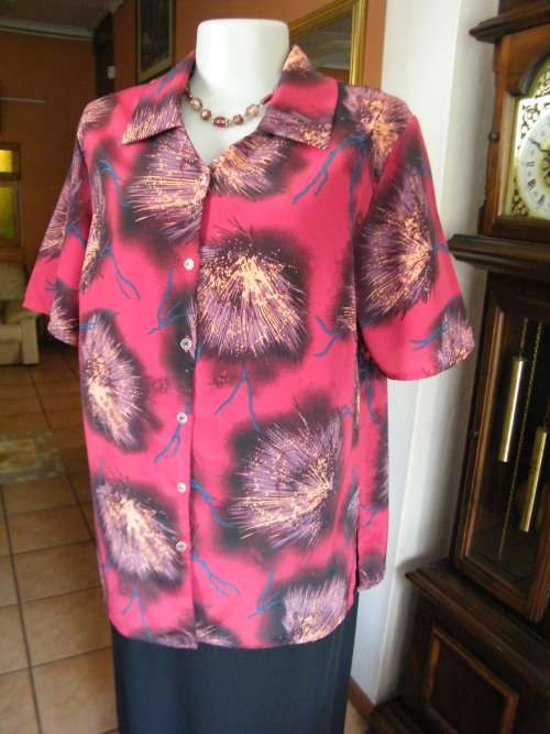 Pretty maroon colour short sleeve top with purple/blue design.Size 36/12.Good condition